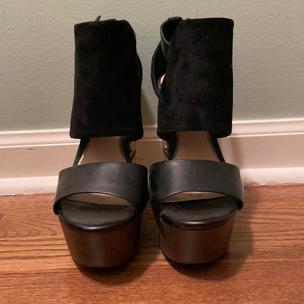 Tall black wedges with gold accent. Size 8.5.